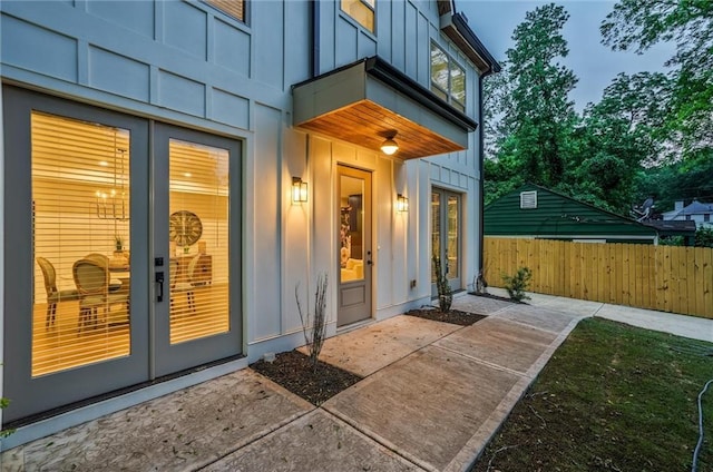 2809 Glenwood Ave SE, Atlanta, GA 30317 - property entrance with board and batten siding, french doors, and a patio
