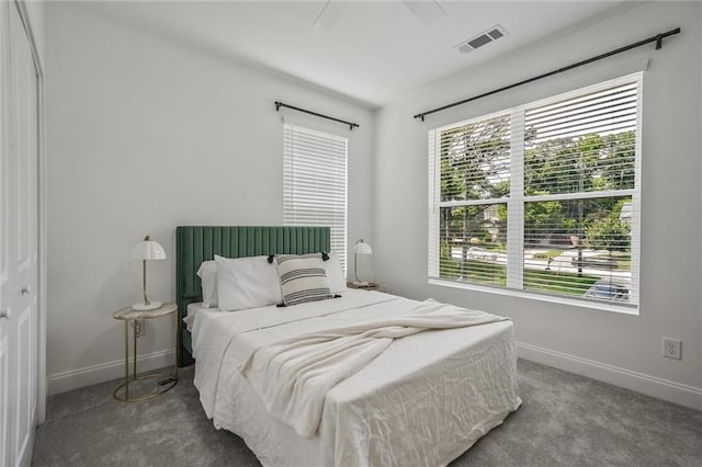 2809 Glenwood Ave SE, Atlanta, GA 30317 - carpeted bedroom featuring baseboards and a ceiling fan
