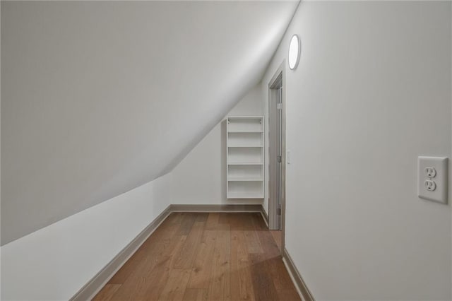 2809 Glenwood Ave SE, Atlanta, GA 30317 - bonus room featuring wood finished floors, vaulted ceiling, and baseboards