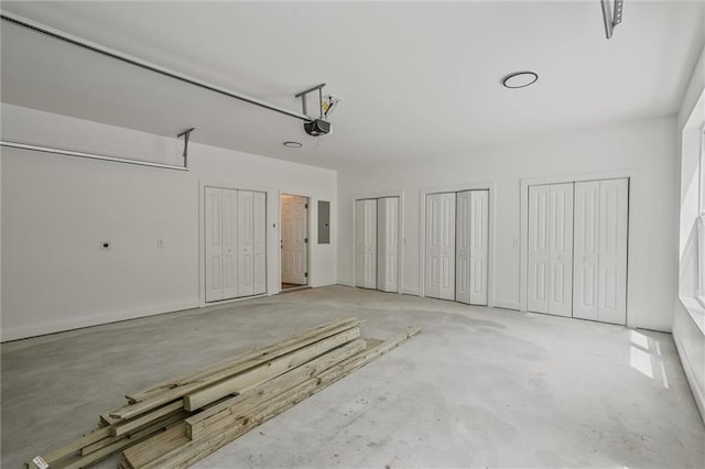 2809 Glenwood Ave SE, Atlanta, GA 30317 - garage featuring a garage door opener and electric panel