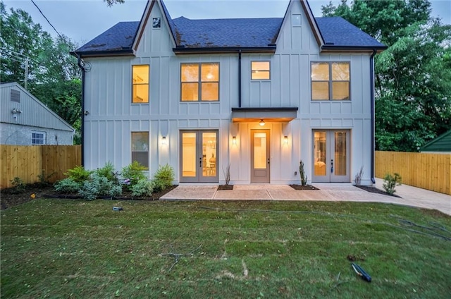 2809 Glenwood Ave SE, Atlanta, GA 30317 - view of front of property featuring board and batten siding, french doors, a patio area, and roof with shingles