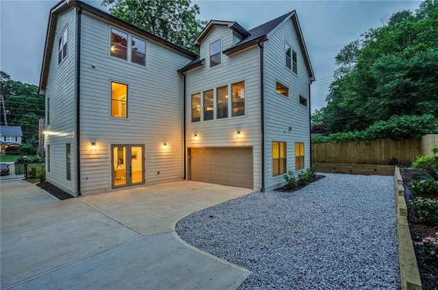 2809 Glenwood Ave SE, Atlanta, GA 30317 - view of front facade with driveway and a garage