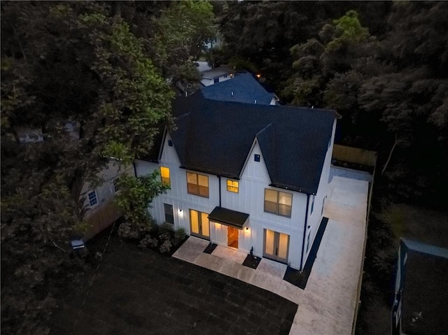 2809 Glenwood Ave SE, Atlanta, GA 30317 - rear view of house with roof with shingles and stucco siding