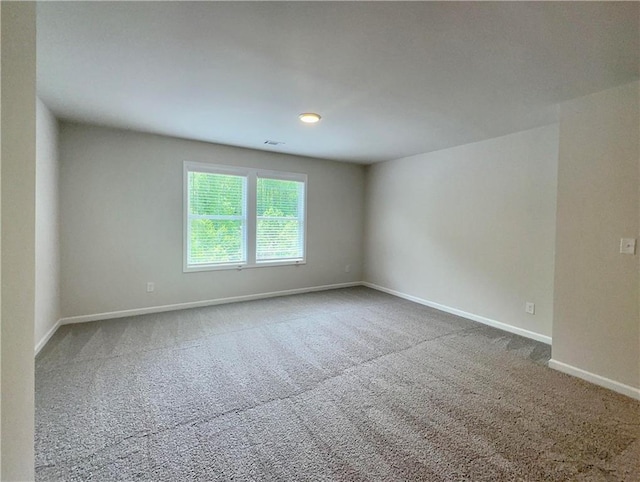 view of carpeted spare room