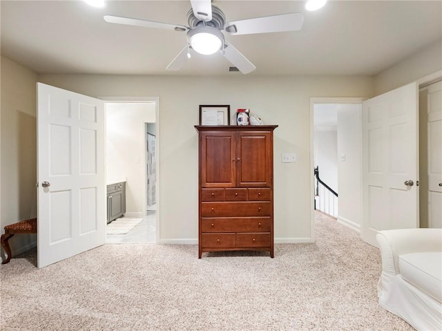350 Fountain Oaks Ln, Atlanta, GA 30342 - bedroom with light colored carpet, connected bathroom, and a ceiling fan