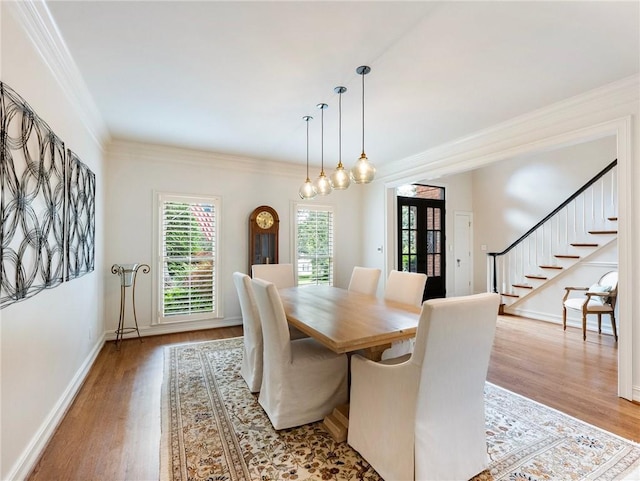 350 Fountain Oaks Ln, Atlanta, GA 30342 - dining area with light wood-style flooring, ornamental molding, french doors, and stairway