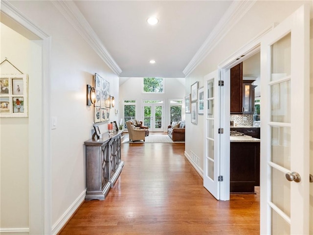350 Fountain Oaks Ln, Atlanta, GA 30342 - hall with french doors, wood finished floors, crown molding, and recessed lighting