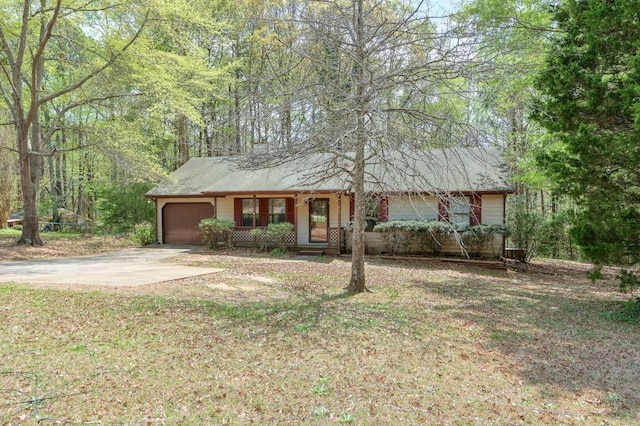 798 Tommy Lee Cook Rd, Palmetto, GA 30268 - single story home with a garage, concrete driveway, and covered porch