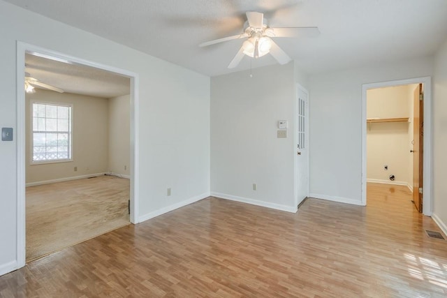 798 Tommy Lee Cook Rd, Palmetto, GA 30268 - empty room with ceiling fan and light wood-style flooring
