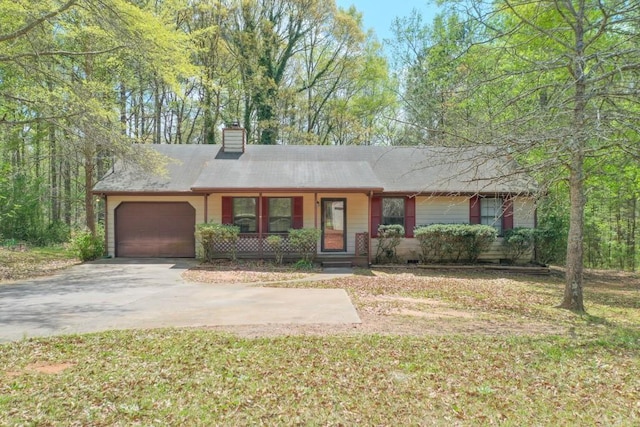 798 Tommy Lee Cook Rd, Palmetto, GA 30268 - single story home featuring a garage, a chimney, a porch, concrete driveway, and a front lawn