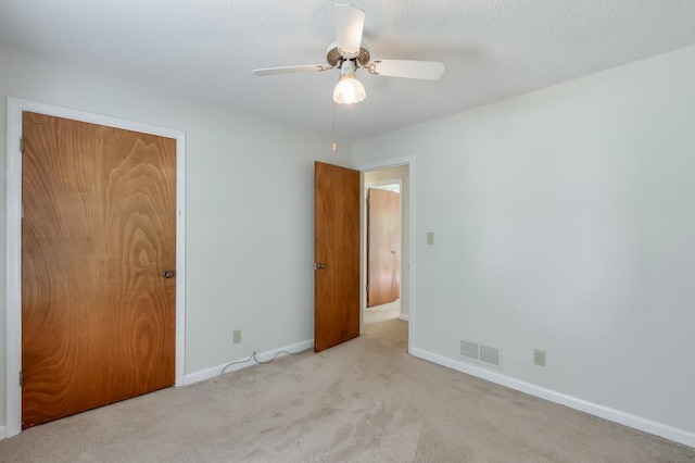 798 Tommy Lee Cook Rd, Palmetto, GA 30268 - unfurnished bedroom with carpet floors and a ceiling fan