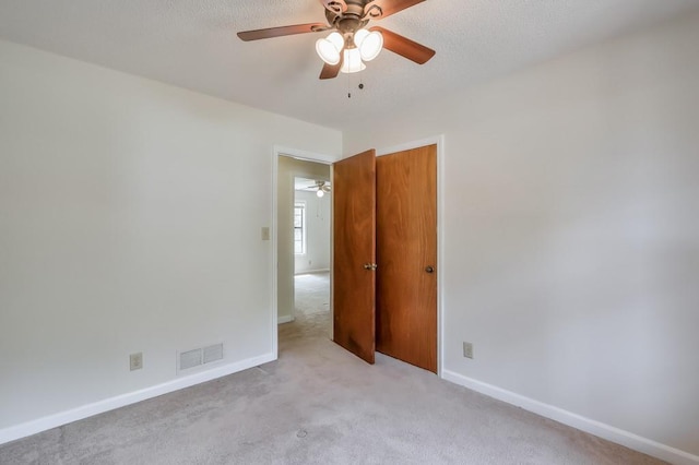 798 Tommy Lee Cook Rd, Palmetto, GA 30268 - unfurnished room with a ceiling fan and light colored carpet