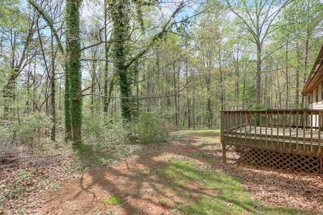 798 Tommy Lee Cook Rd, Palmetto, GA 30268 - view of yard featuring a deck and a wooded view
