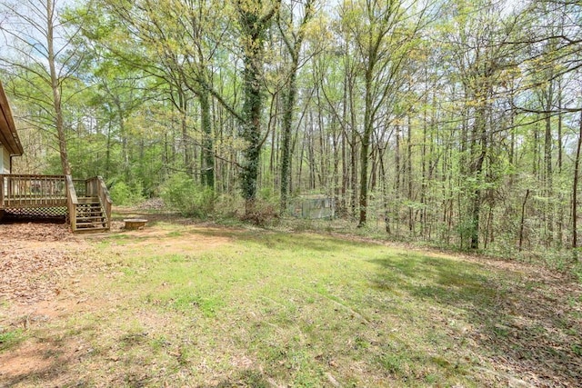 798 Tommy Lee Cook Rd, Palmetto, GA 30268 - view of green lawn featuring a deck and a wooded view