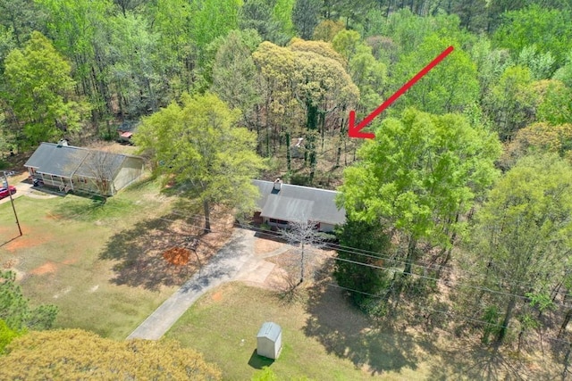 798 Tommy Lee Cook Rd, Palmetto, GA 30268 - aerial view of property and surrounding area featuring a heavily wooded area