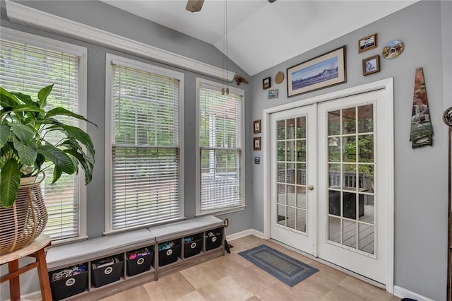doorway to outside featuring french doors, a ceiling fan, lofted ceiling, and a healthy amount of sunlight