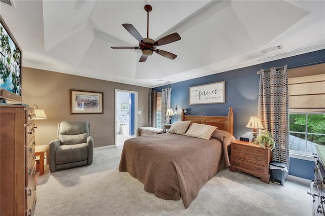 bedroom with a raised ceiling, baseboards, carpet, and visible vents