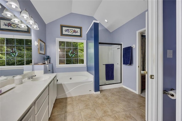 full bath featuring vanity, a garden tub, tile patterned floors, a stall shower, and vaulted ceiling