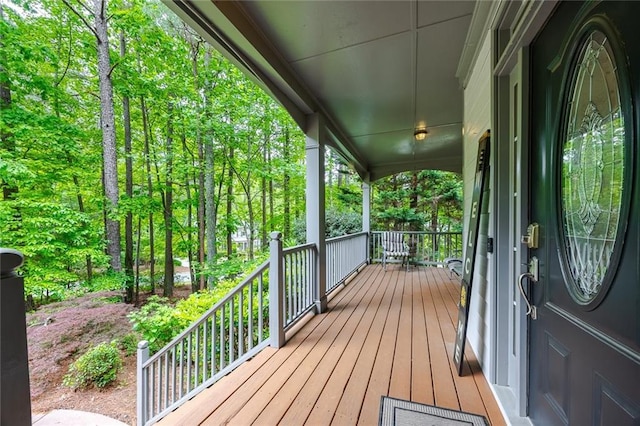 wooden deck featuring covered porch