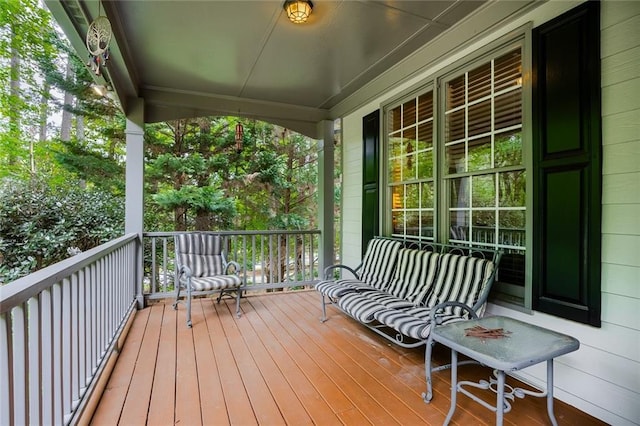 wooden terrace with covered porch