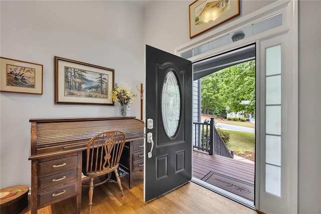 foyer with light wood-style floors