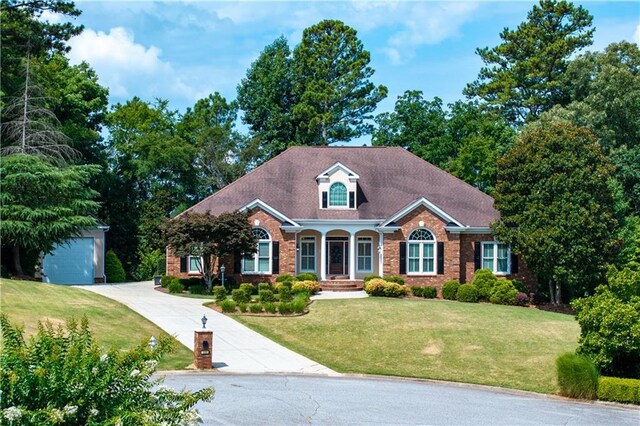 view of front of home featuring a yard