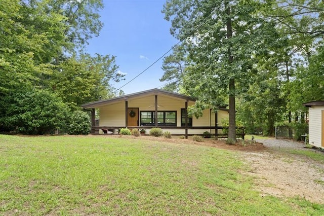 exterior space with a front lawn