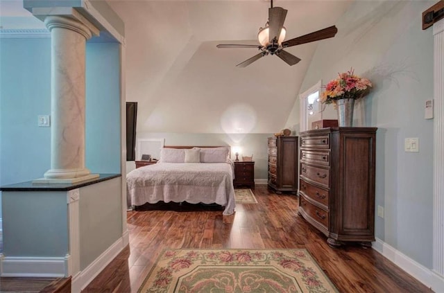 bedroom featuring dark hardwood / wood-style flooring, decorative columns, vaulted ceiling, and ceiling fan