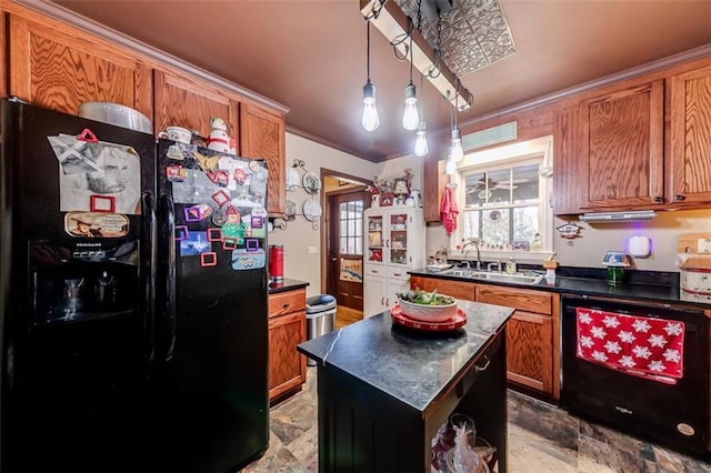 kitchen with dishwashing machine, sink, crown molding, a kitchen island, and black fridge