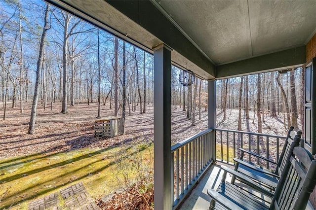 unfurnished sunroom featuring a wealth of natural light