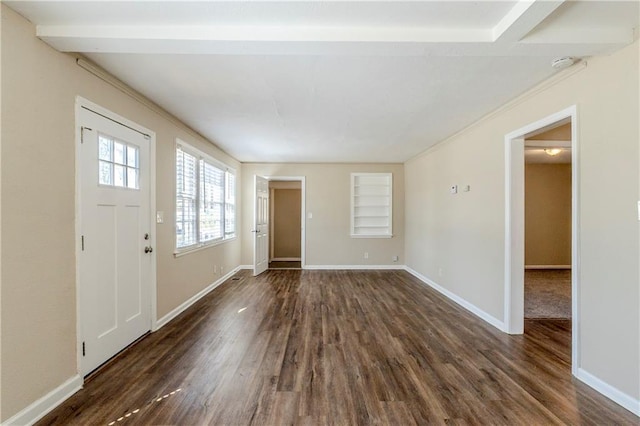 foyer entrance featuring baseboards and dark wood-style flooring