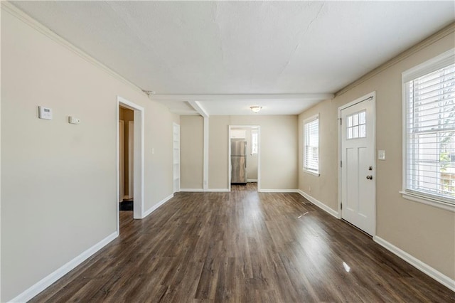 entryway featuring baseboards and dark wood-style flooring