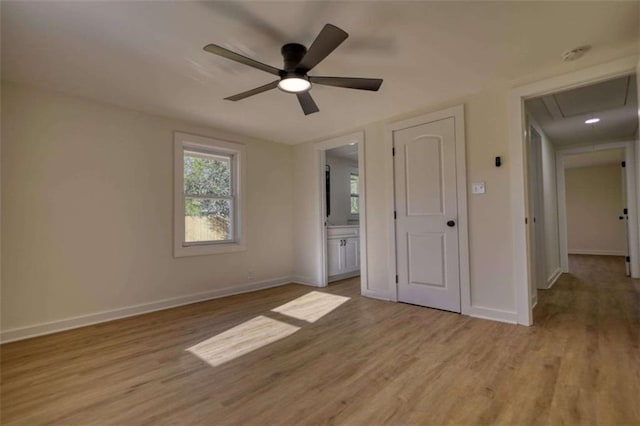 unfurnished bedroom featuring ceiling fan and light hardwood / wood-style floors