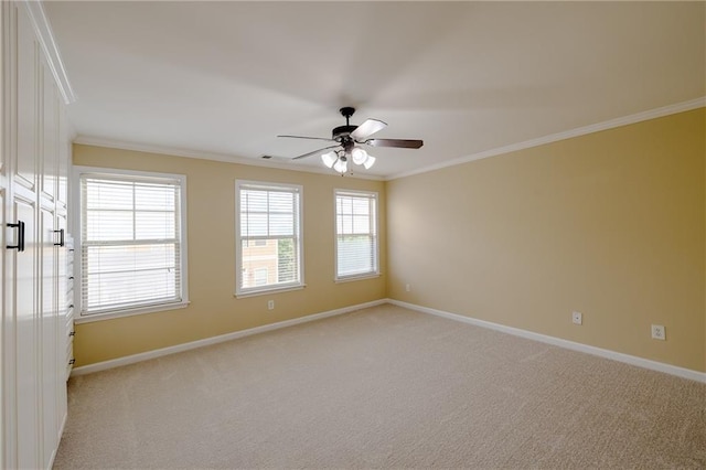 4400 Village Field Pl, Suwanee, GA 30024 - empty room featuring ornamental molding, ceiling fan, baseboards, and light carpet