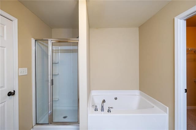 4400 Village Field Pl, Suwanee, GA 30024 - full bathroom featuring a stall shower, a garden tub, and a walk in closet