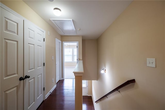 4400 Village Field Pl, Suwanee, GA 30024 - corridor with attic access, dark wood-style floors, and baseboards