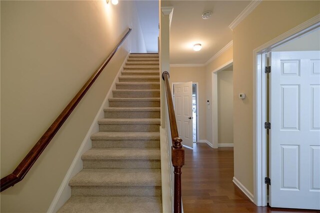 4400 Village Field Pl, Suwanee, GA 30024 - stairs with crown molding, baseboards, and wood finished floors
