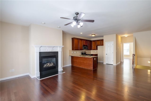 4400 Village Field Pl, Suwanee, GA 30024 - kitchen featuring open floor plan, appliances with stainless steel finishes, ceiling fan, dark wood-style floors, and recessed lighting