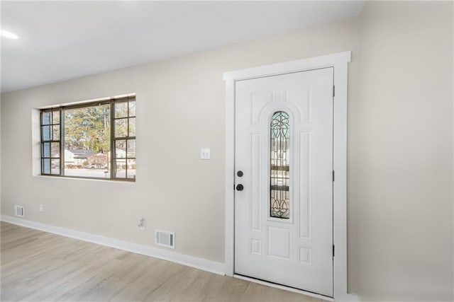 foyer entrance featuring light wood-type flooring