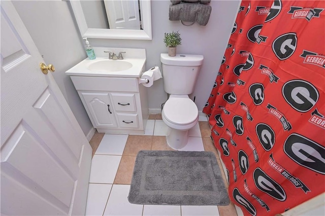 bathroom featuring vanity, tile patterned floors, toilet, and a shower with curtain