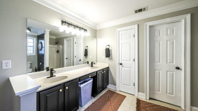 full bath featuring ornamental molding, tile patterned flooring, visible vents, and a sink