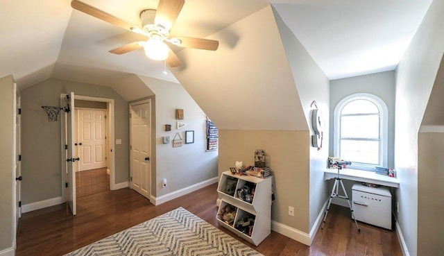 additional living space featuring lofted ceiling, ceiling fan, baseboards, and wood finished floors