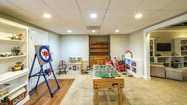 playroom with carpet, baseboards, and recessed lighting