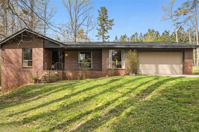 ranch-style home with a front lawn and a garage