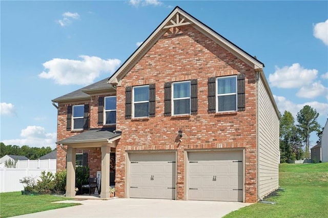 view of front of home featuring driveway, brick siding, and fence