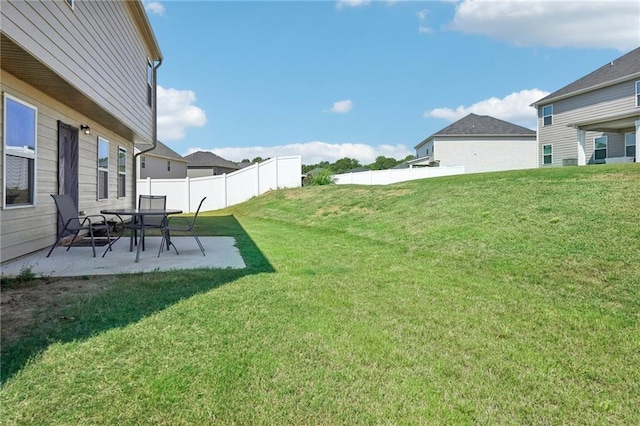 view of yard with a patio and fence