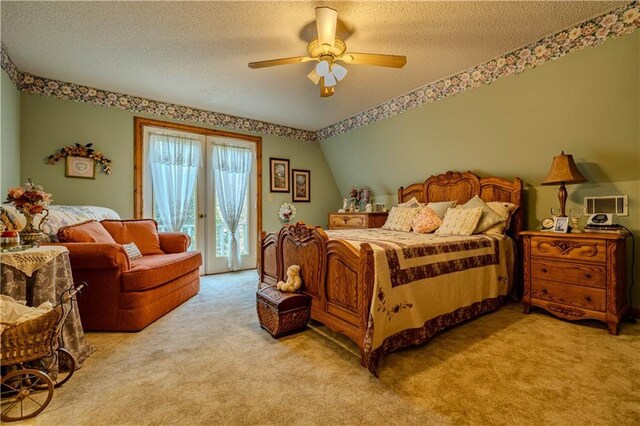 living room with hardwood / wood-style flooring, ceiling fan, and a textured ceiling