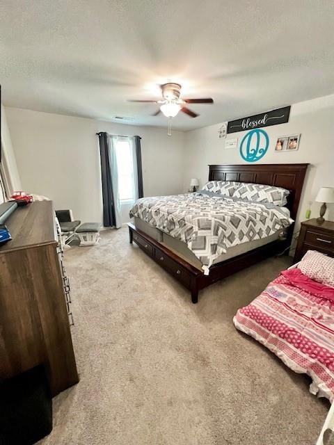 bedroom featuring carpet floors and ceiling fan