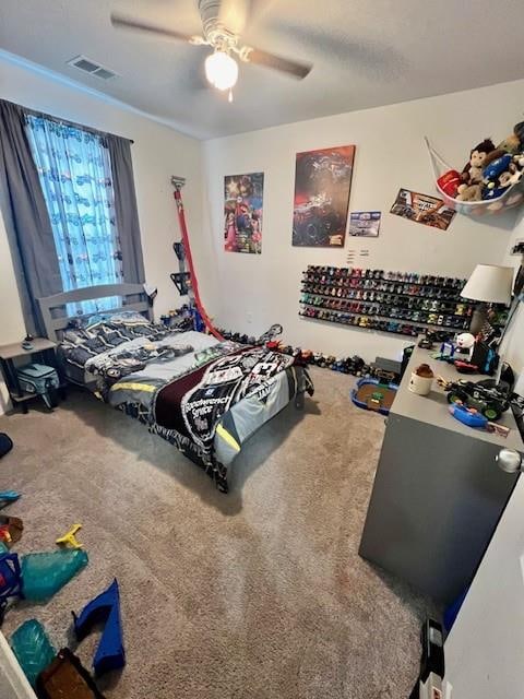 bedroom featuring carpet flooring and ceiling fan