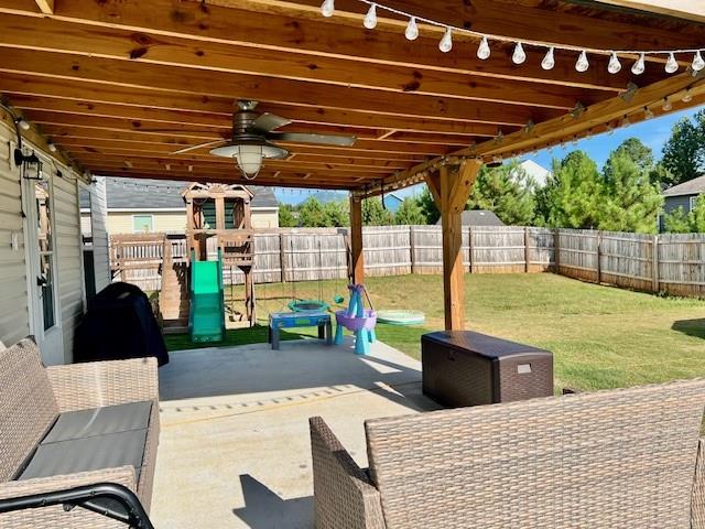 view of patio / terrace with ceiling fan